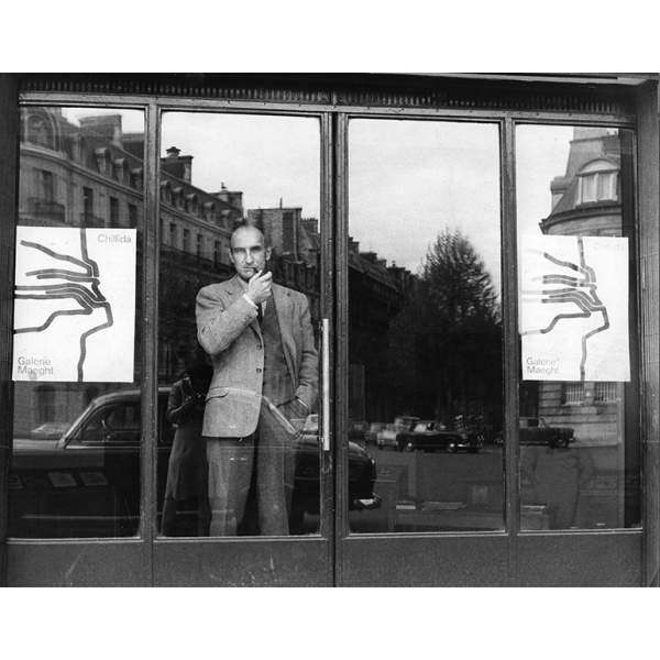 At the entrance of the Galerie Maeght, Paris, on the occasion of his solo exhibition